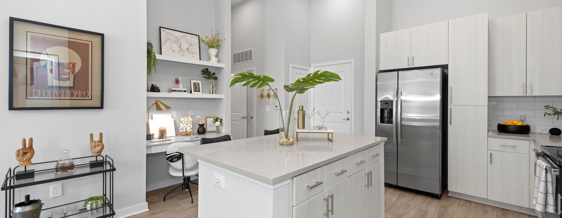 a kitchen with white cabinets